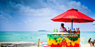 Man selling drink on the beach